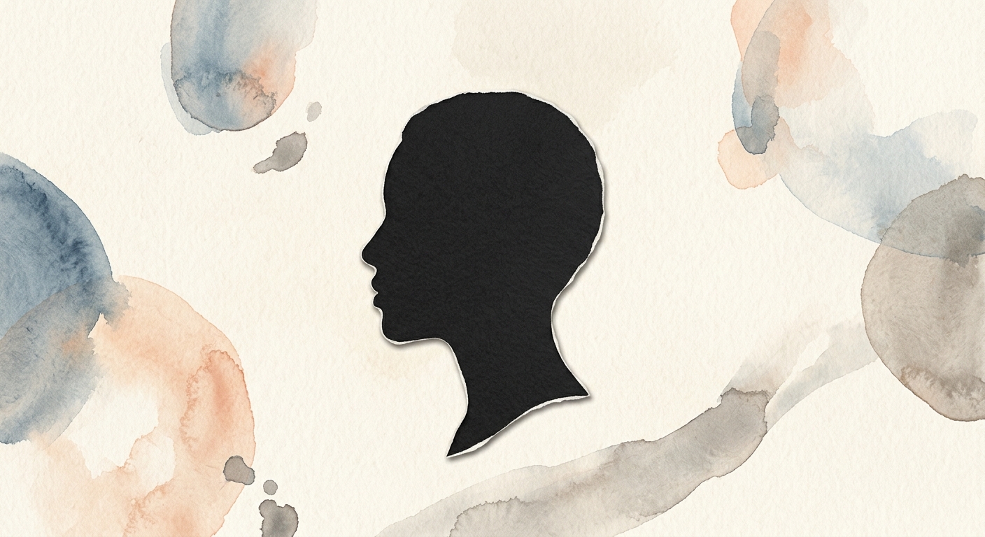 Schwarze Silhouette aus Papier vor cremefarbenem Hintergrund